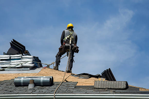 Professional Roof Replacement technician working in Latimer, MS